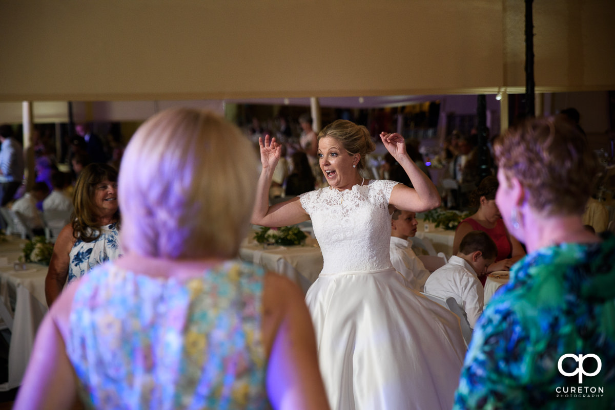 Guests dancing at the Grace Hall wedding reception to the sounds of DJ Sam from PPE Event Group.