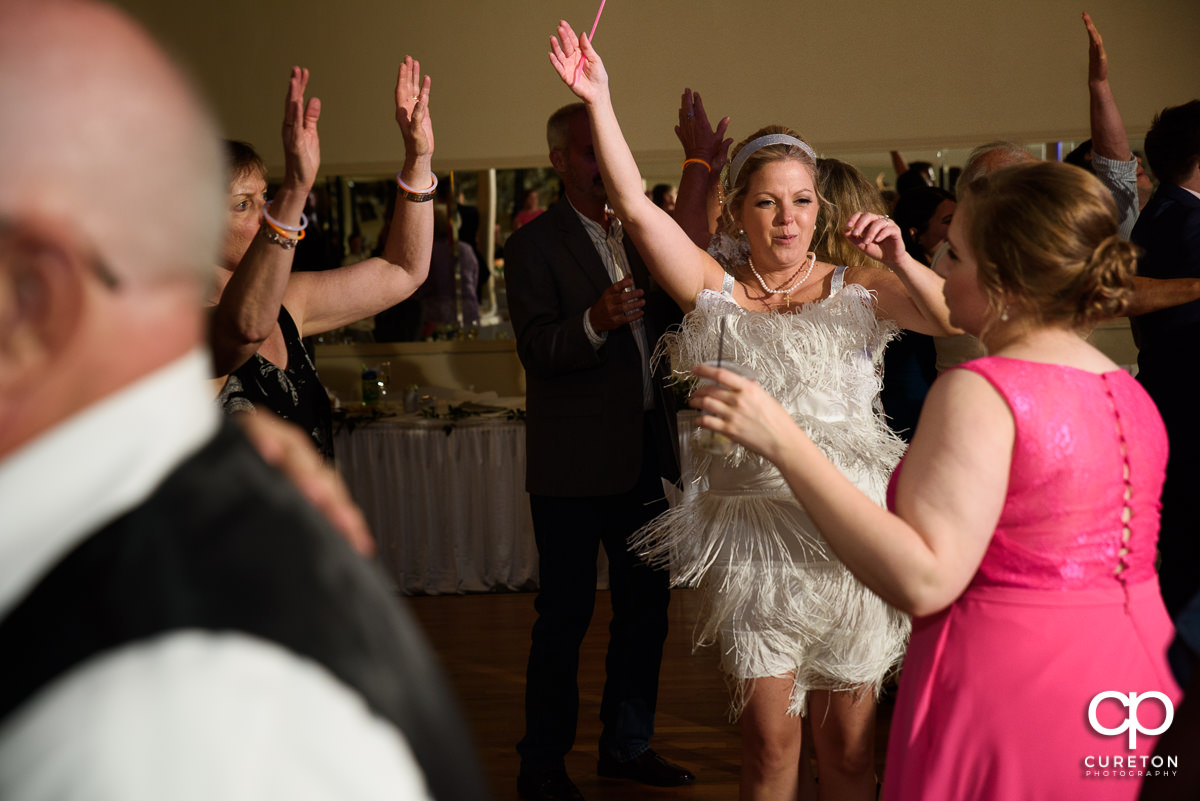 Guests dancing at the Grace Hall wedding reception to the sounds of DJ Sam from PPE Event Group.