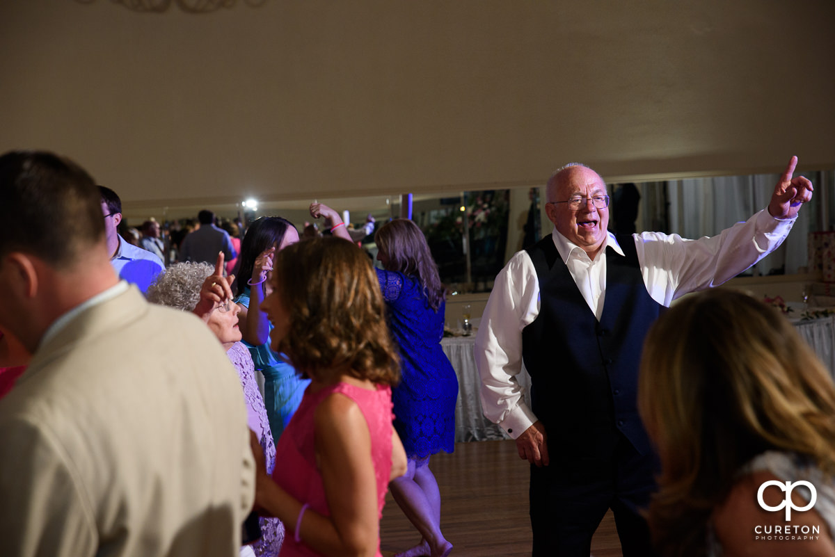 Guests dancing at the Grace Hall wedding reception to the sounds of DJ Sam from PPE Event Group.