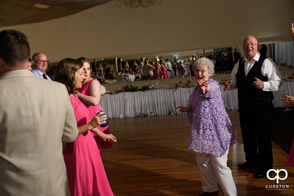 Guests dancing at the Grace Hall wedding reception to the sounds of DJ Sam from PPE Event Group.