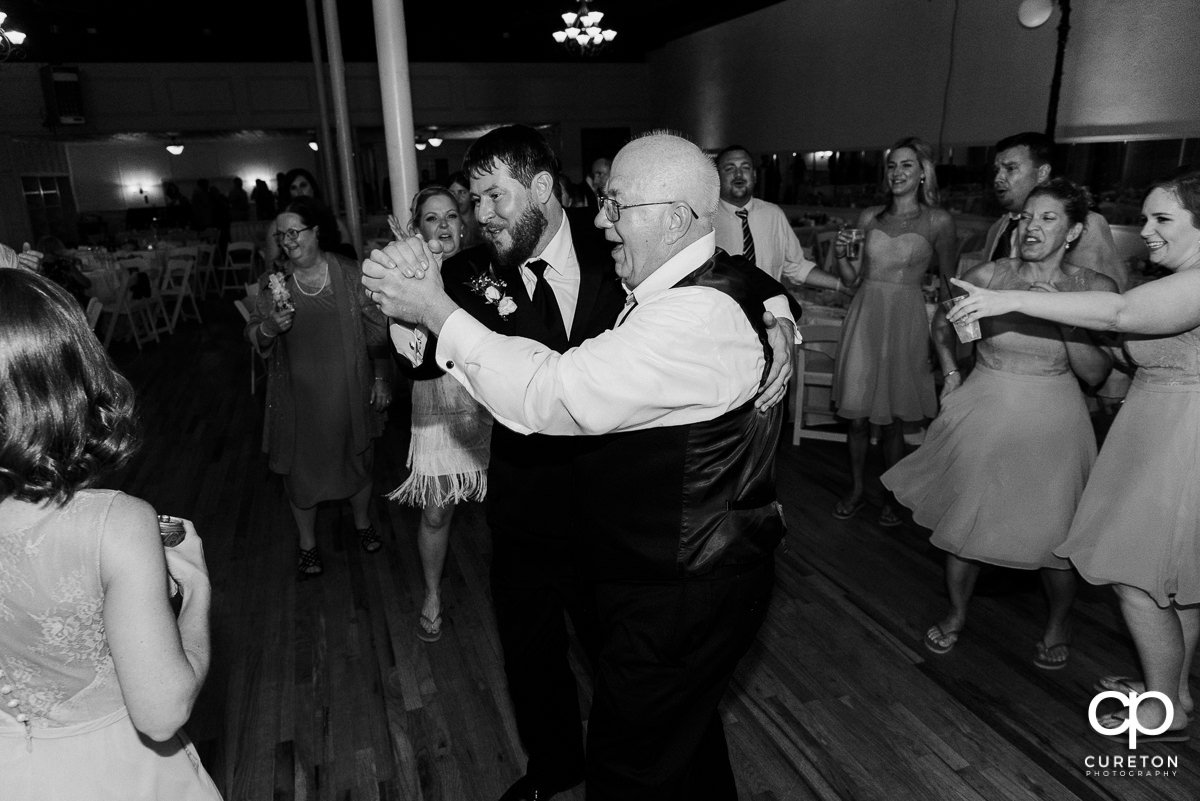 Guests dancing at the Grace Hall wedding reception to the sounds of DJ Sam from PPE Event Group.