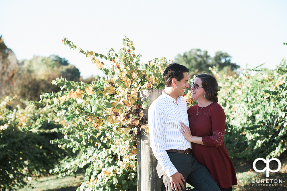 Engaged couple during their rustic farm engagement session near Greenville South Carolina.