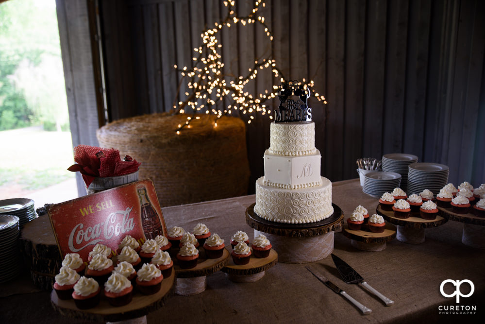 Wedding cake and cupcakes.