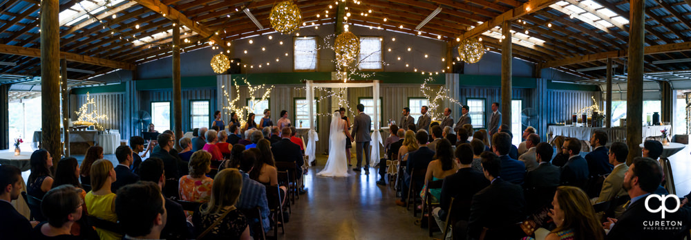 Pano of a wedding indoors at Greenbrier Farms.