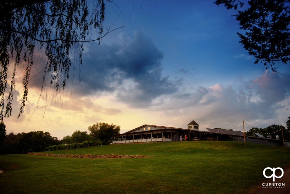 Greenbrier Farms, a wedding venue in Easley SC, at sunset.