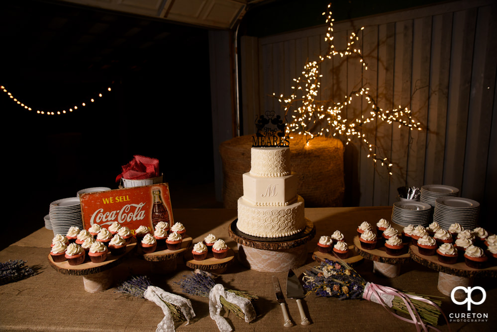 Wedding cake and cupcake.
