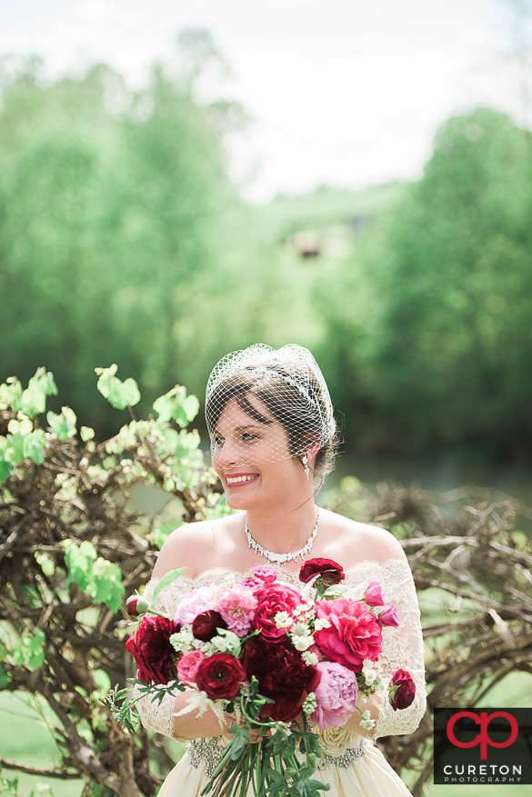 Bride holding her flowers at Greenbrier farms.