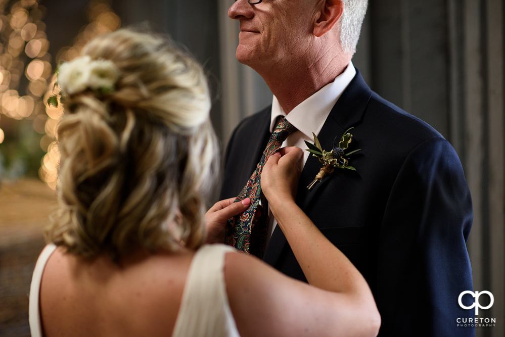 Bride and father first look before the wedding.