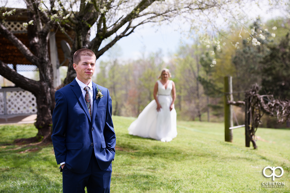 Bride and groom first look before their wedding at Greenbrier Farms.