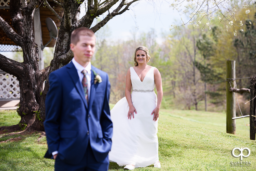 Bride and groom first look before their wedding at Greenbrier Farms.