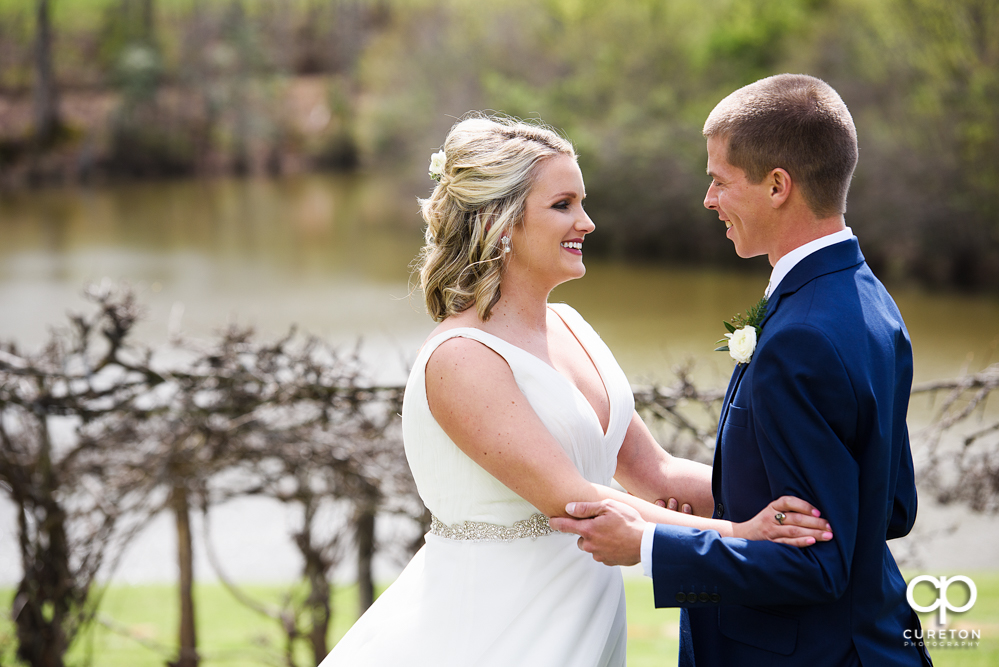 Bride and groom first look before their wedding at Greenbrier Farms.