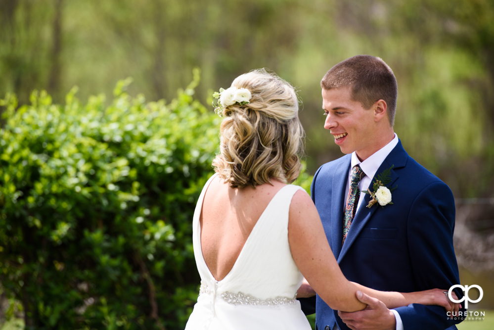 Bride and groom first look before their wedding at Greenbrier Farms.