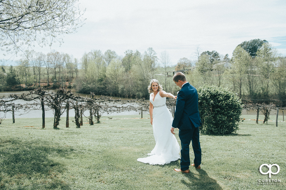 Bride and groom first look before their wedding at Greenbrier Farms.