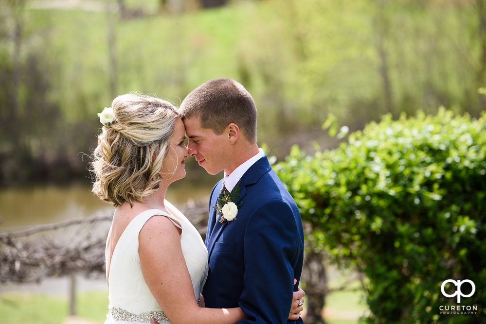 Bride and groom first look before their wedding at Greenbrier Farms.