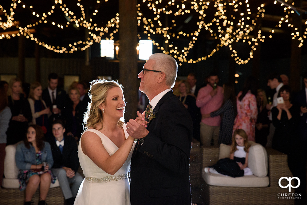 Bride and Father dance at the wedding reception.