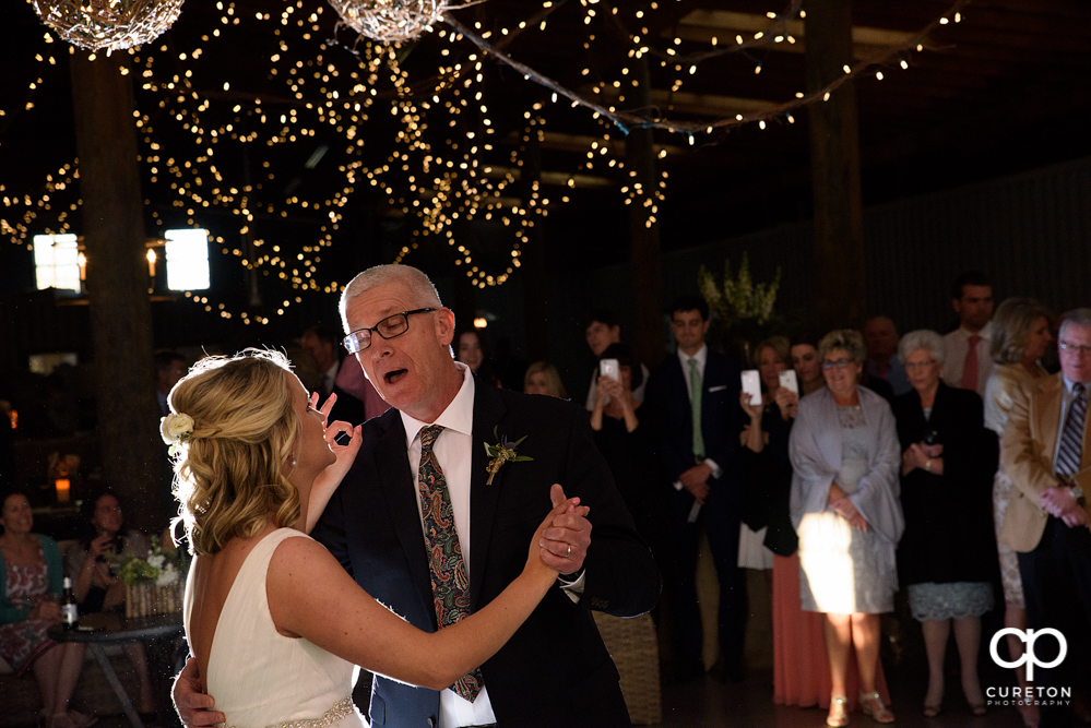 Bride and Father dance at the wedding reception.