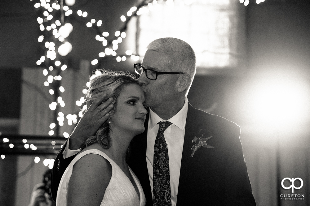 Bride and Father dance at the wedding reception.