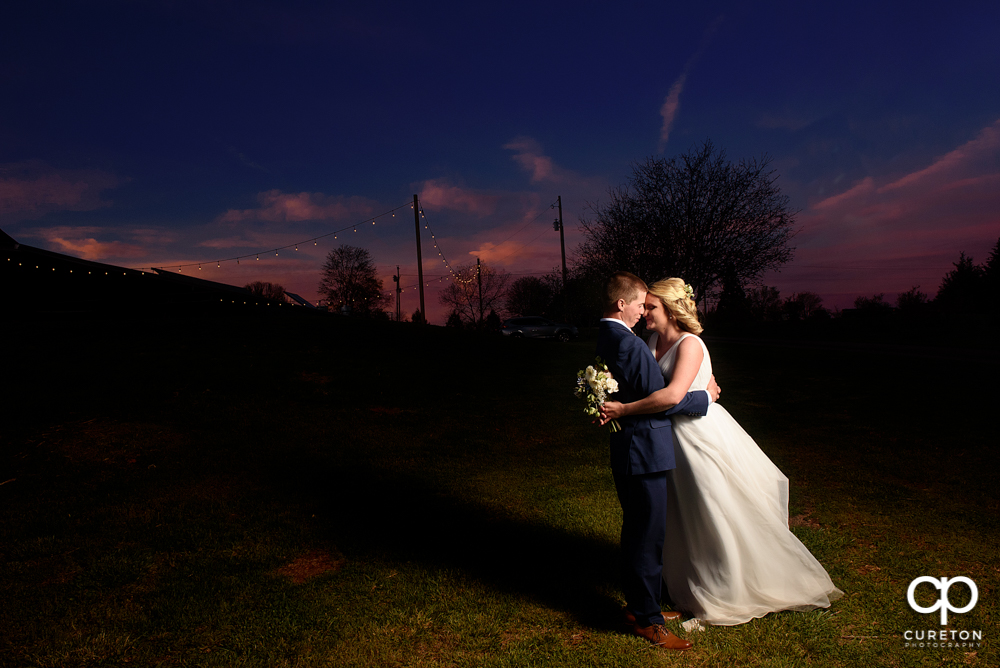 Greenbrier Farms sunset with bride and groom.
