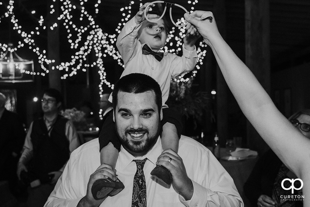 Wedding Guests dancing at the Greenbrier Farms wedding reception while Uptown Entertainment dj's.