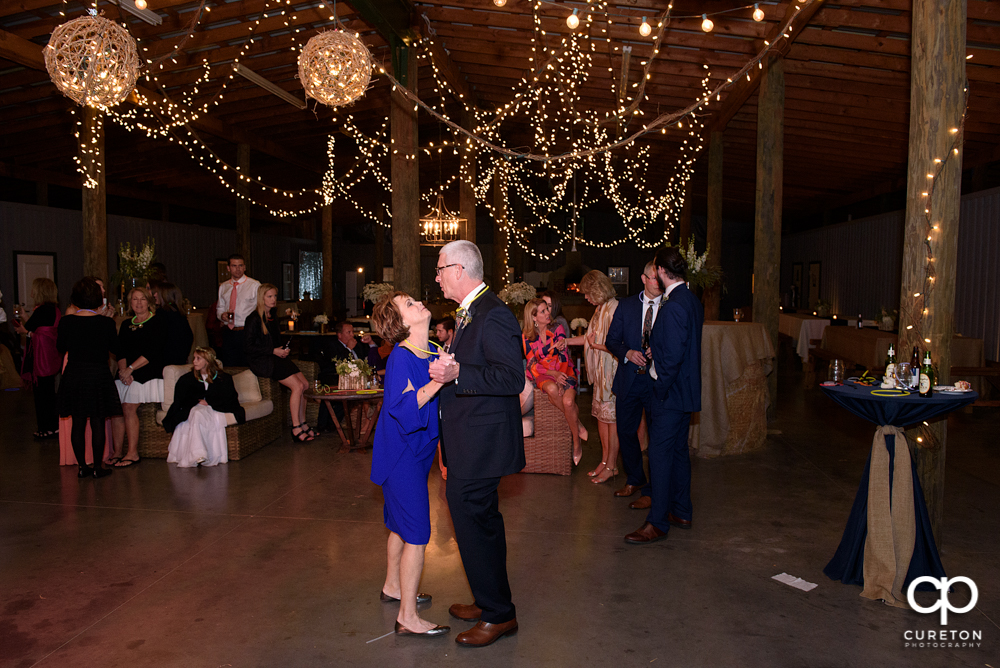 Wedding Guests dancing at the Greenbrier Farms wedding reception while Uptown Entertainment dj's.