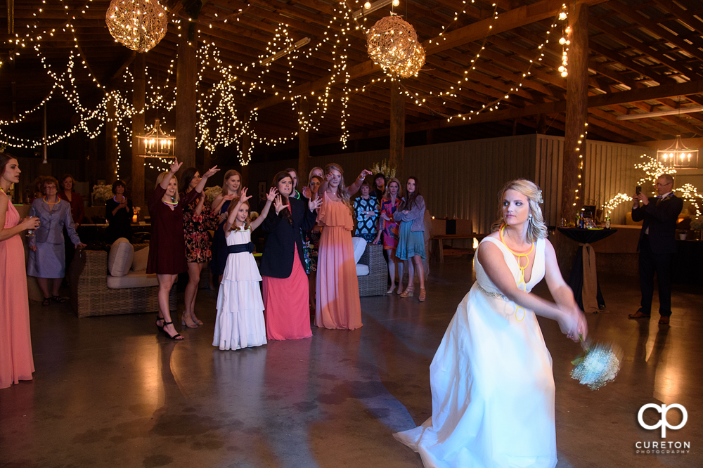 Bride tossing the bouquet.