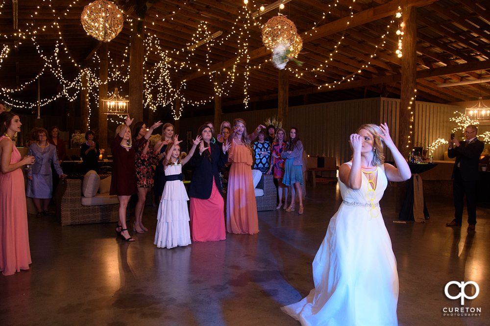 Bride tossing the bouquet.