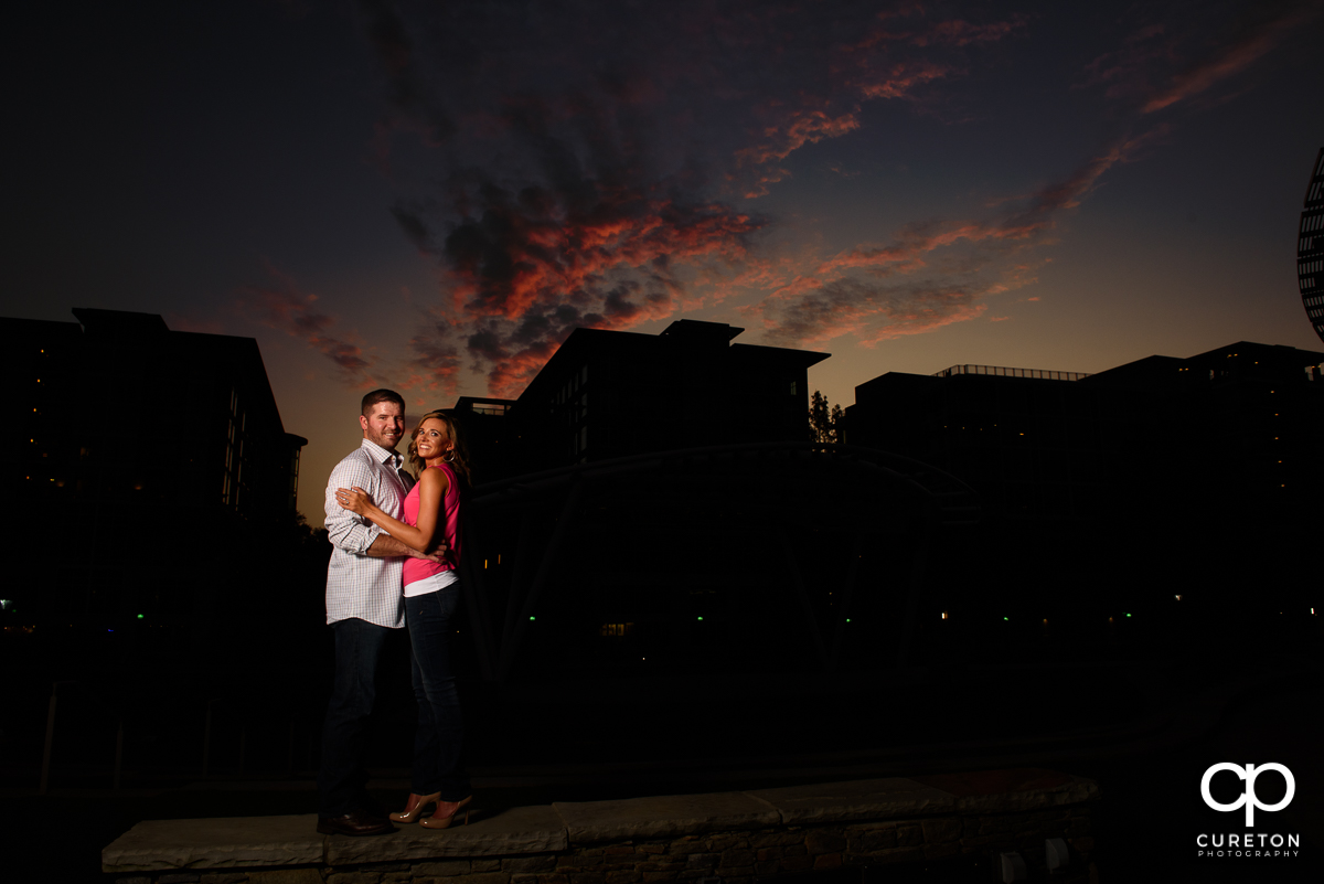 Engaged couple at sunset.