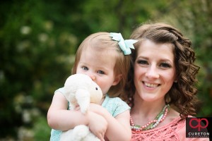 Mom and daughter during a family photo session at the Rock Quarry Garden in Greenville,SC.