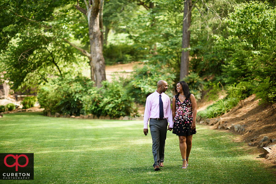 Couple walking in the Rock Quarry GArden.