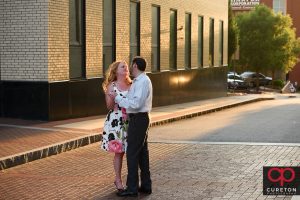 Couple dancing by the Westin Poinsett in downtown Greenville, SC.