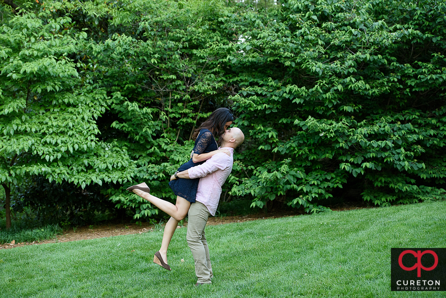 Couple dancing in the park.