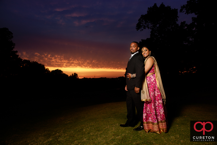 Indian Bride and Groom at sunset after their wedding.