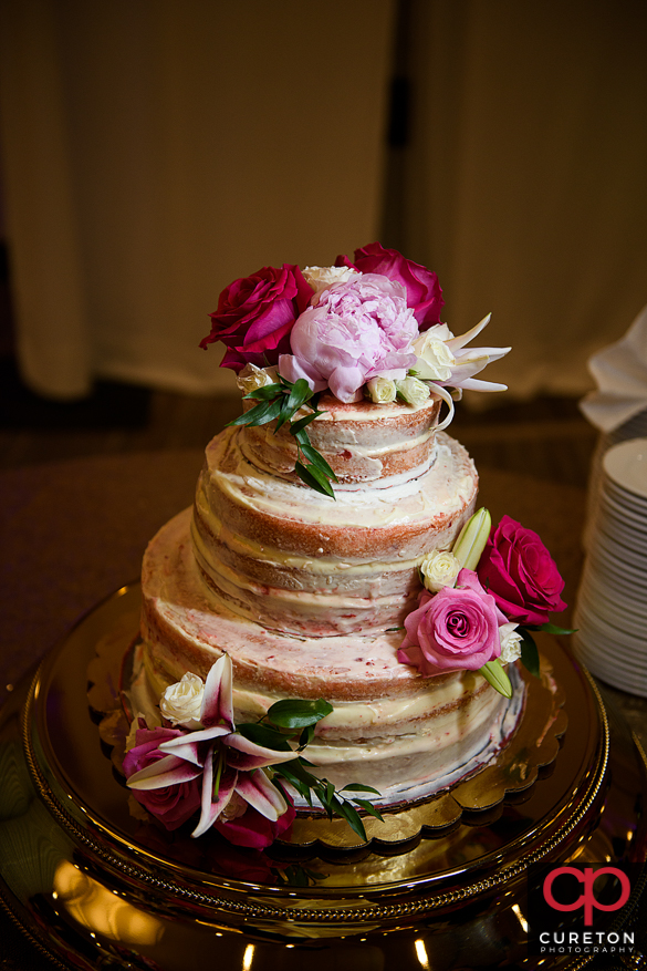 Wedding cake with flowers.