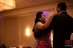 Bride and her father sharing a dance at her wedding.