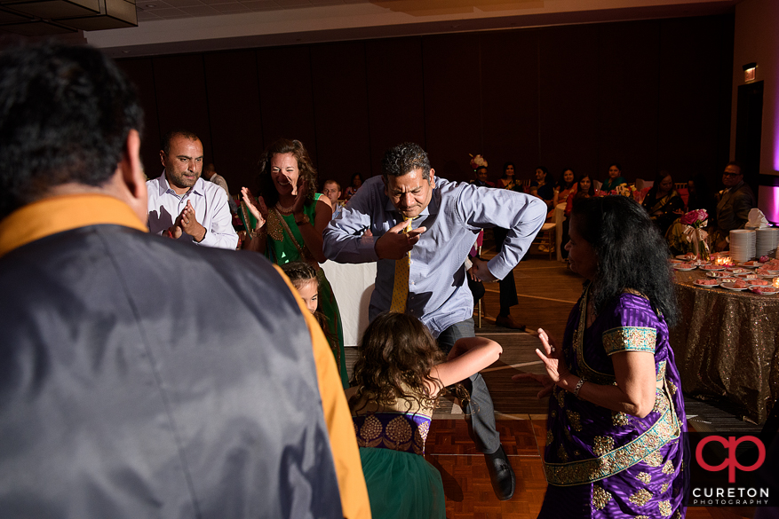 Wedding guests dancing on a packed dance floor in Greenville,Sc to the sounds of DJ Desi.