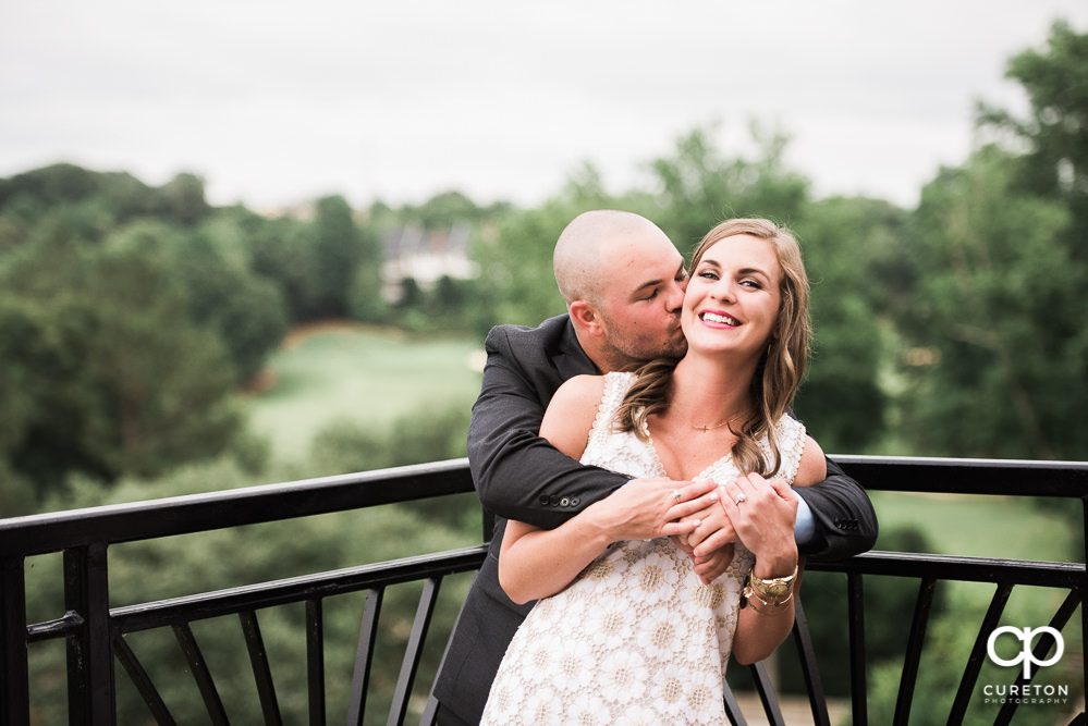 Bride and groom outside after their wedding rehearsal dinner at the Thornblade Country Club in Greenville , SC .