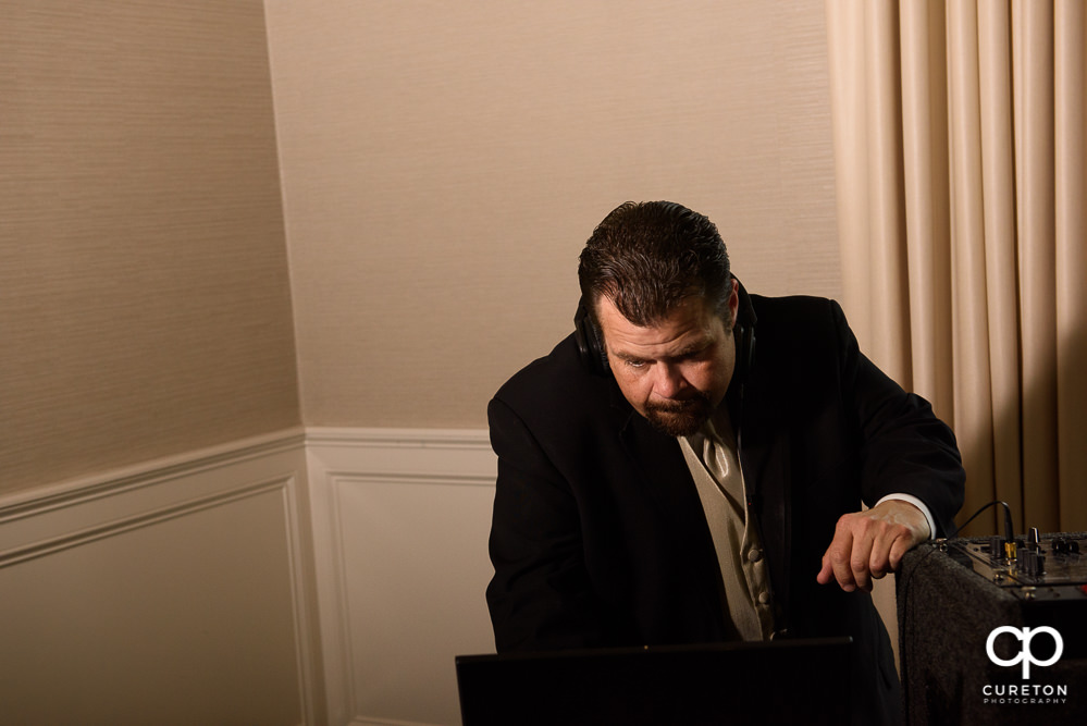 The DJ at the wedding rehearsal dinner.