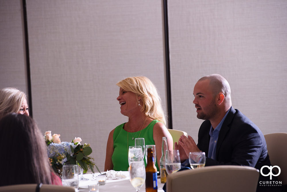 Guests enjoying themselves at the rehearsal dinner in Greenville.