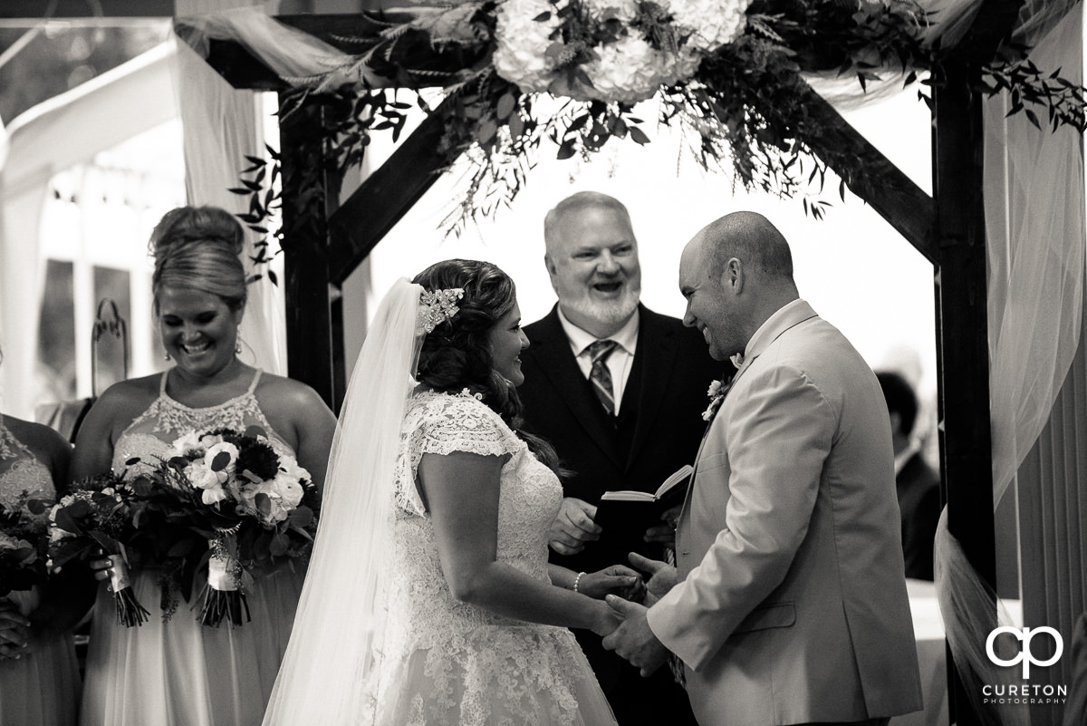 Bride and groom saying their vows.