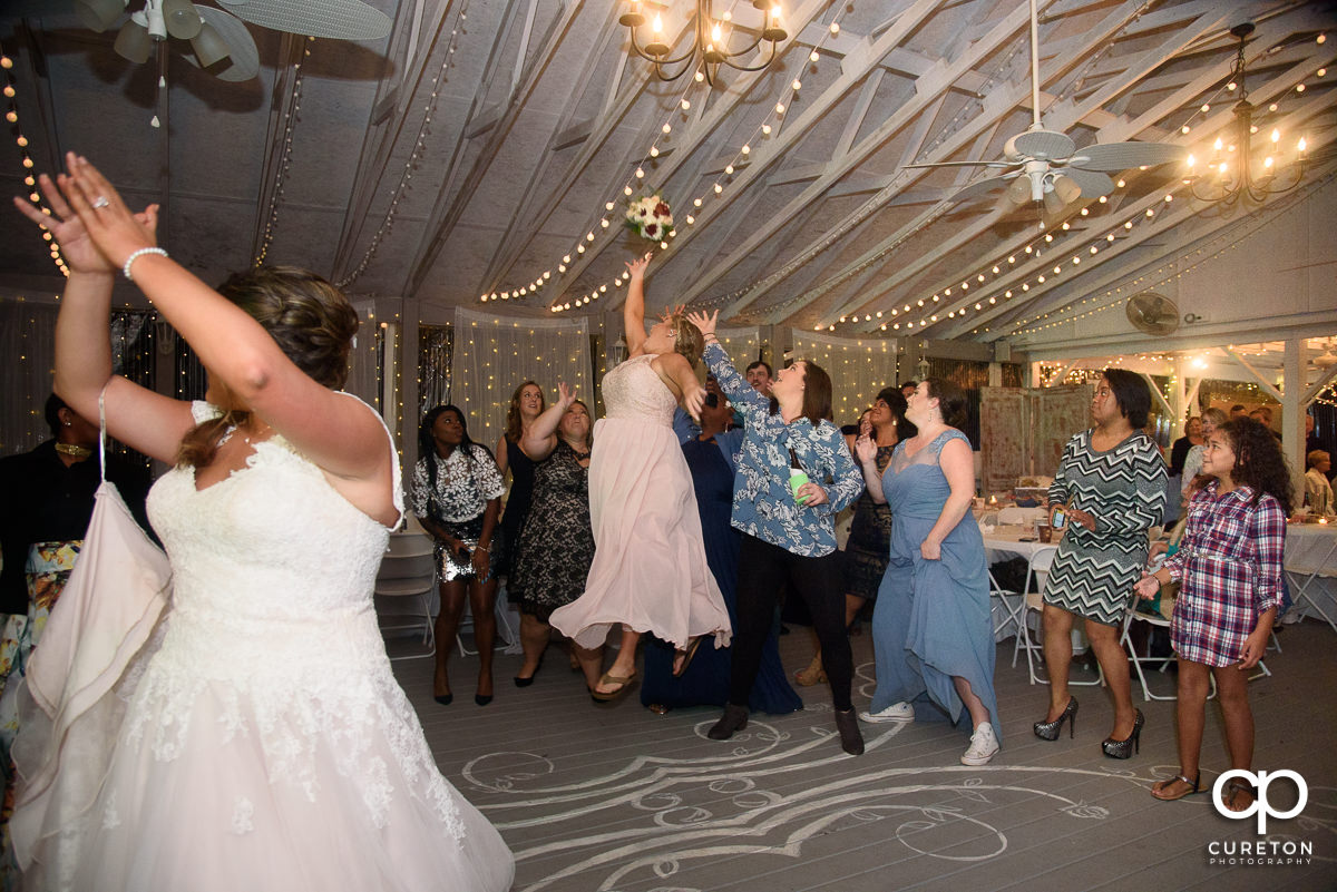 Bride tossing the bouquet.