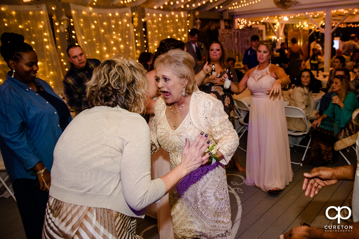 Mother of the bride dancing at the reception.
