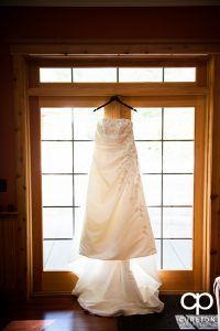 The bride's dress hanging up.