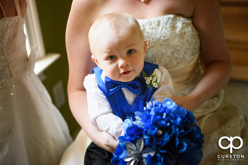 The bride and groom's cute child.