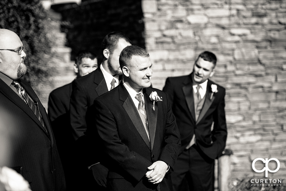 The groom sees his bride for the first time.