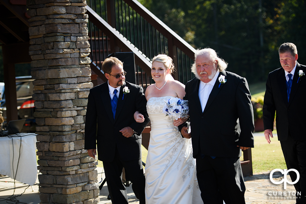 Beautiful bride walking down the aisle.