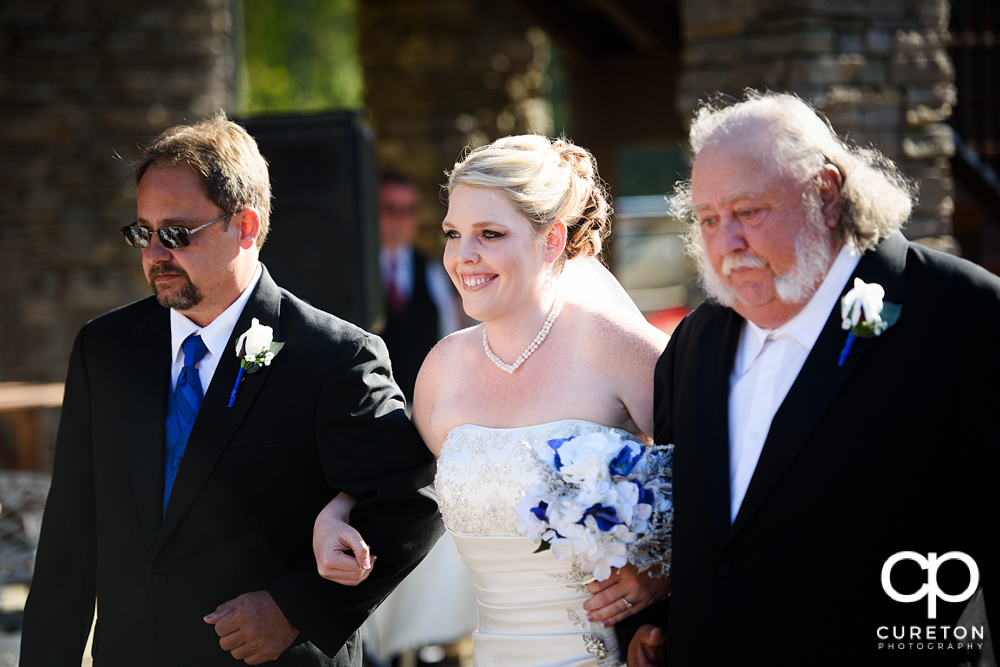 Bride walking down the aisle at the hollow at Paris mountain.