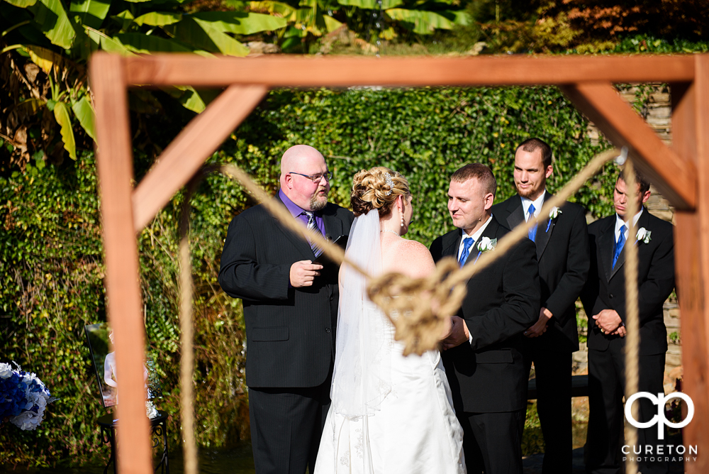 The bride and groom during their wedding ceremony.