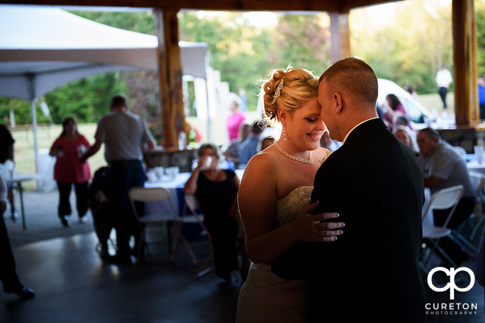 Bride and groom having a first dance.