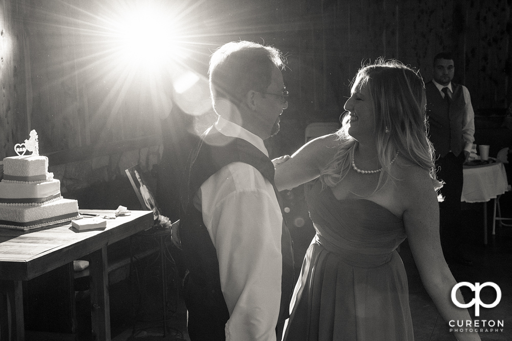 Guests dancing to the sounds of Parker entertainment at the wedding reception.