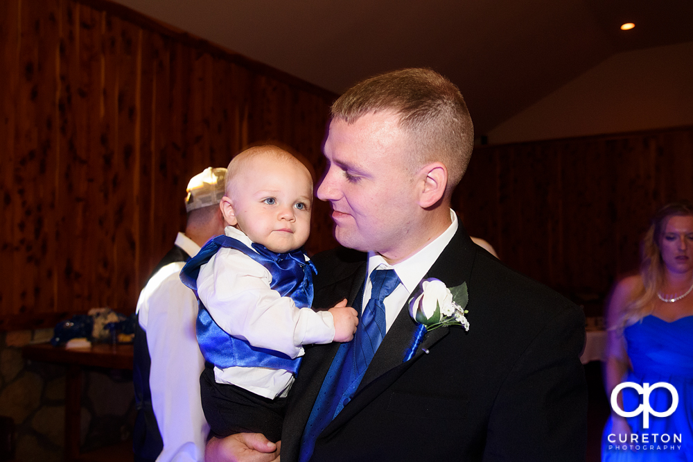 Groom and his son.
